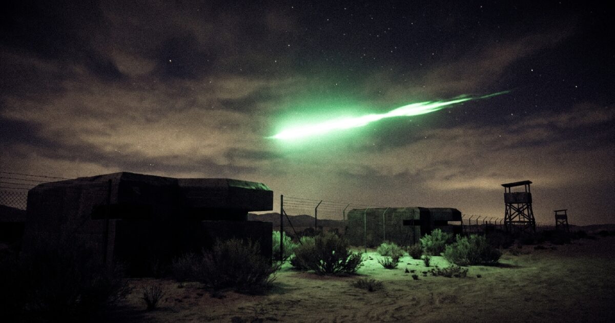 Green fireball over a 1940s desert nuclear installation, evoking the DOE and CIA UAP files released in the PURSUE tranches